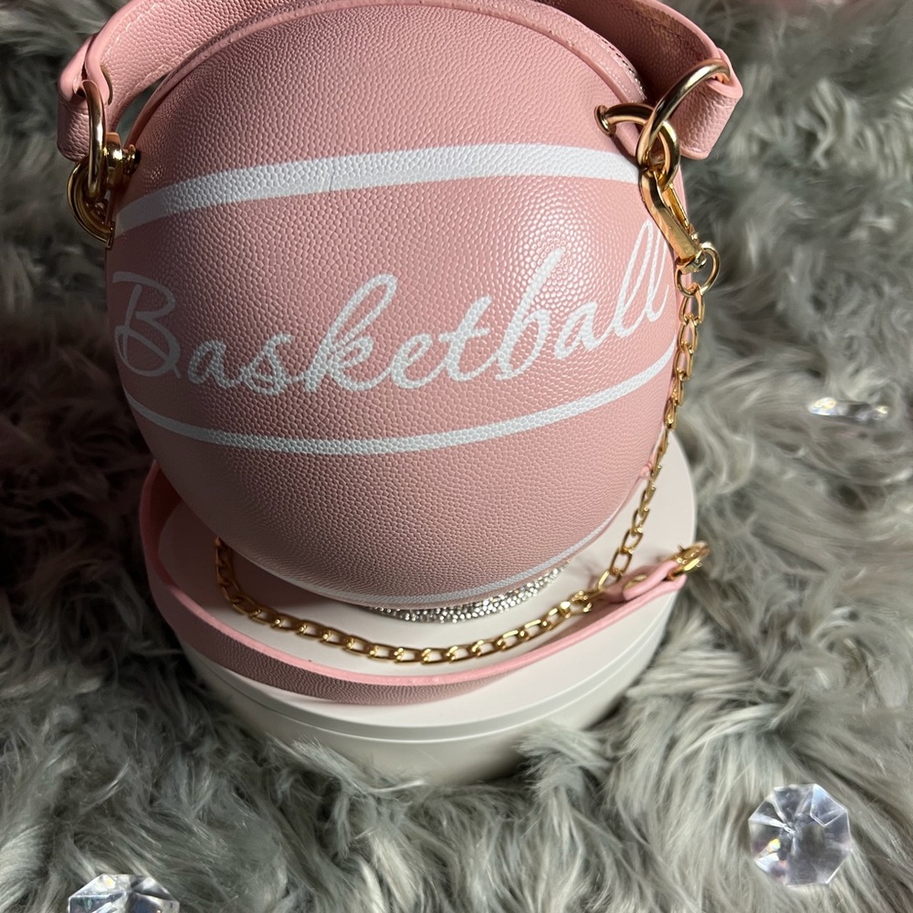 Pink and white basketball shaped crossbody bag